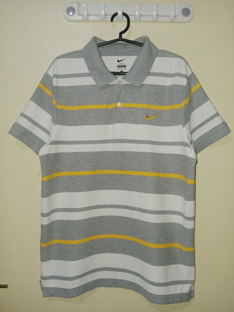 Nike Stripe Polo Shirt (Category: Tshirts & Polo Shirts ) located in Taguig. Submitted by brent_de_belen (Listing ID 1467072125, Image 1). Description: Size XL on Tag Length: 26.5 Width: 19.5 Excellent condition, no issue..