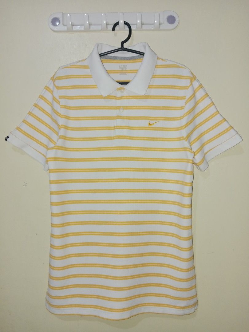 Nike Stripe Polo Shirt (Category: Tshirts & Polo Shirts ) located in Taguig. Submitted by brent_de_belen (Listing ID 1467072520, Image 1). Description: Size L on Tag Length: 27 (front) 28 (back) Width: 18.5 Excellent condition, no issue..