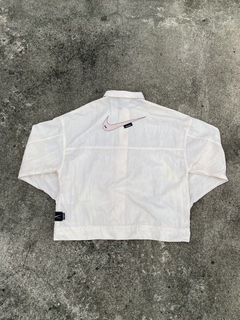 Nike Swooshwear White Button-Up Jacket (Category: Coats, Jackets and Outerwear) located in Manila. Submitted by fastturtle.4c6bfd (Listing ID 1466982597, Image 3). Description: Nike Woven Jacket 22.24.5 Excellent Condition 550.