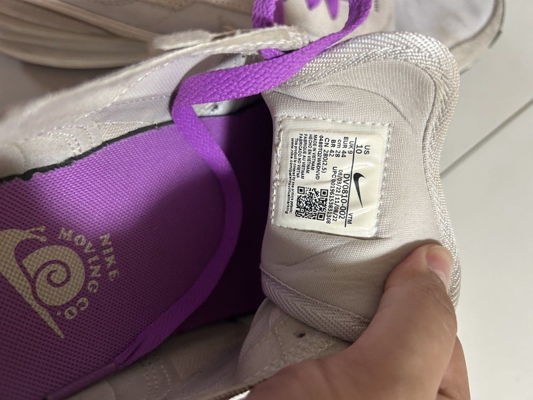 Nike Waffle One SE Nike Moving Co. Size 10 (Category: Sneakers) located in Taytay. Submitted by teddyy08 (Listing ID 1467104062, Image 3). Description: - Brand/Model: Nike Waffle One SE - Colorway: Light grey and white with vibrant purple laces - Special Detail: Nike Moving Co. snail graphic printed on the purple insole - Materials: Suede overlays and textile mesh panels - Size: US 10 / UK 9 / EUR 44 - Condition: Worn thrice with minor dirt marks