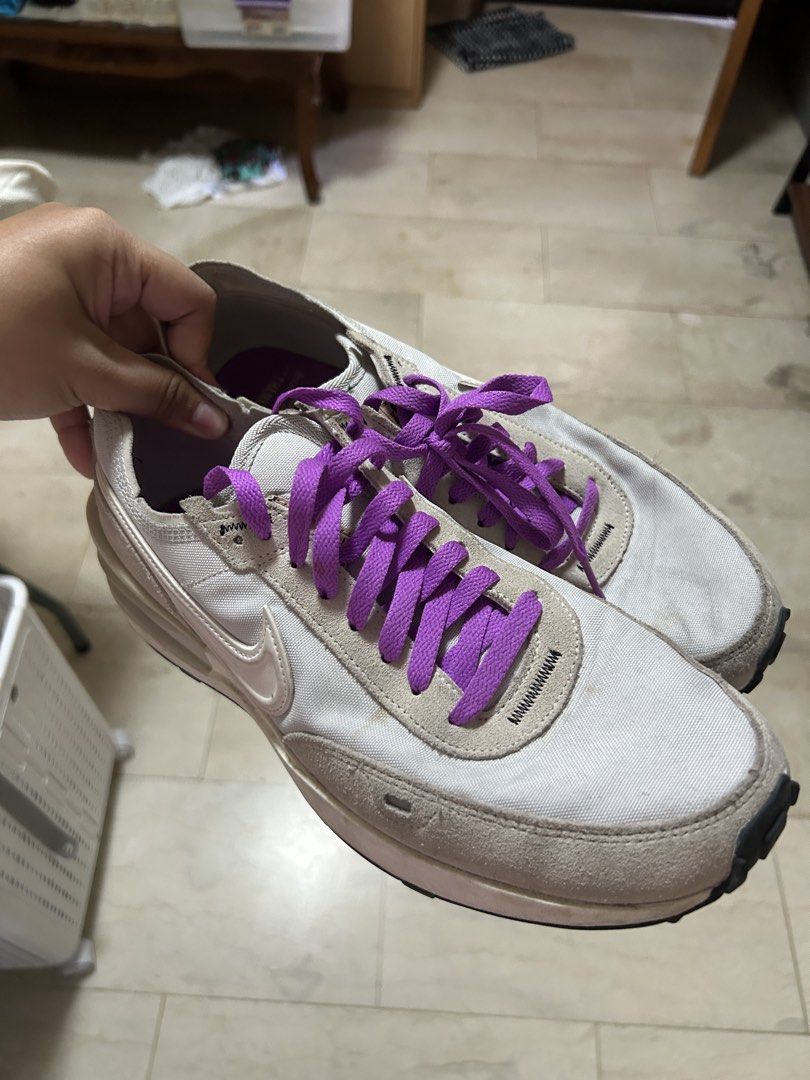 Nike Waffle One SE Nike Moving Co. Size 10 (Category: Sneakers) located in Taytay. Submitted by teddyy08 (Listing ID 1467104062, Image 2). Description: - Brand/Model: Nike Waffle One SE - Colorway: Light grey and white with vibrant purple laces - Special Detail: Nike Moving Co. snail graphic printed on the purple insole - Materials: Suede overlays and textile mesh panels - Size: US 10 / UK 9 / EUR 44 - Condition: Worn thrice with minor dirt marks