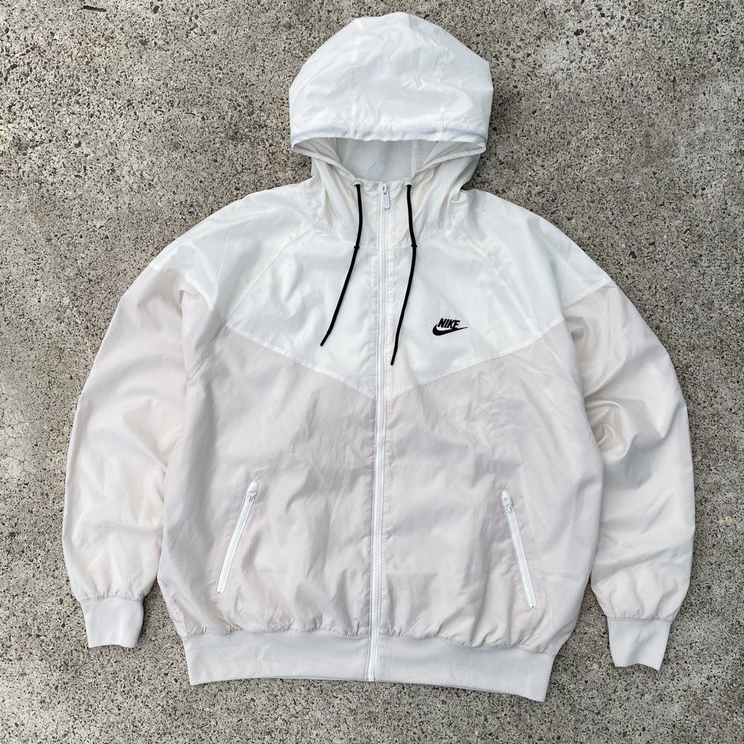 Nike windbreaker (Category: Coats, Jackets and Outerwear) located in Lapu-Lapu City. Submitted by larry_oliver (Listing ID 1467134459, Image 1). Description: Nike windbreaker! Fit XL Dimension 27W x 28L Condition 9.6/10 Color rate 9.8/10 Issue: minimal stain Pm🏷️.