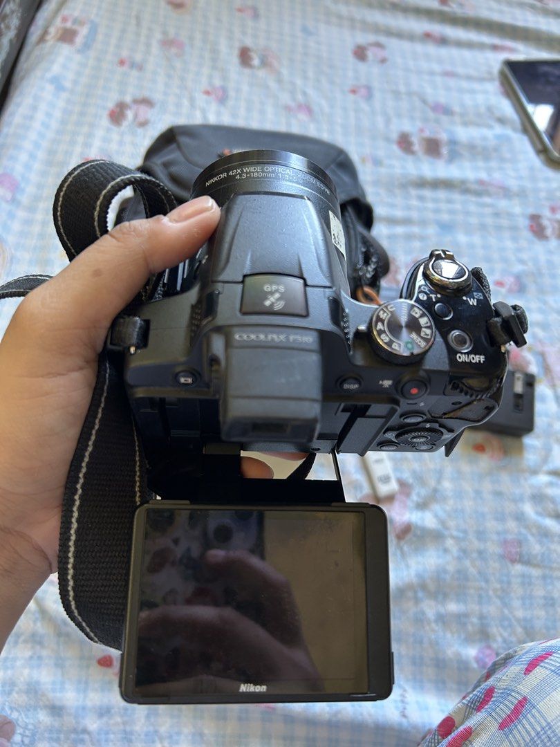 Nikon Coolpix P510 Digital Camera (Category: Cameras) located in Caloocan City. Submitted by aliyahnico45041 (Listing ID 1467003860, Image 3). Description: - Model: Nikon Coolpix P510 Digital Camera (Black) - Lens: 42x wide optical zoom - Features: Built-in GPS, fully tested and working - Condition: Good working condition with minor cosmetic wear near the right strap mount - Perfect all-in-one travel setup ready for your next adventure! For sale 