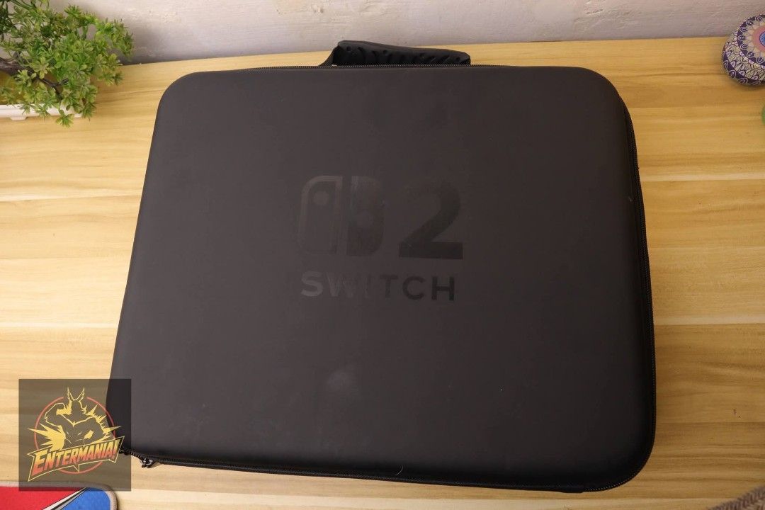 Nintendo Switch 2 Hard Carrying Storage Case Black (Category: Cases & Covers) located in Taytay. Submitted by iamdion30 (Listing ID 1466994544, Image 2). Description: - Compatible with Nintendo Switch 2 - Black hard carrying case with durable outer shell - Custom-cut foam interior securely holds console, controllers, and accessories - Equipped with a secure zipper closure and convenient carrying handle - Keeps all your gaming gear organized in on