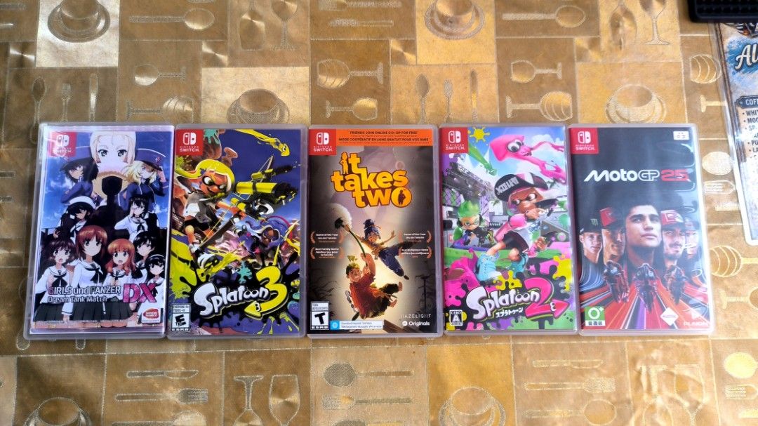 Nintendo Switch Games (Category: Nintendo) located in Manila. Submitted by jml_17 (Listing ID 1466976630, Image 1). Description: - 5 Nintendo Switch games: Splatoon 3, It Takes Two, Splatoon 2, Girls und Panzer Dream Tank Match DX, and MotoGP 25 - Includes original plastic cases and cover art for all titles - Clean, well-kept, and adult-owned condition - 100% working and ready to play - Great value bundle to instantly grow your Switch game collec