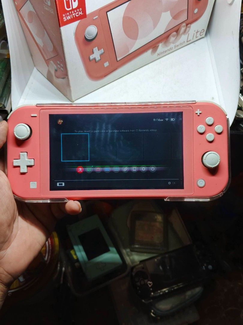 Nintendo switch lite (Category: Nintendo) located in Caloocan City. Submitted by grand_rabbit (Listing ID 1467152956, Image 3). Description: - Model: Nintendo Switch Lite - Color: Coral Pink - Condition: Good (7/10), tested and fully working - Inclusions: Original box and clear protective case - Design: Compact, lightweight handheld console ideal for travel and on-the-go gaming - Features: Integrated controls and bright screen display.