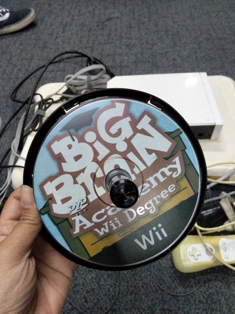 Nintendo Wii Console Bundle with Balance Board and Games (Category: Nintendo) located in Taguig. Submitted by choiisexyy (Listing ID 1466972887, Image 3). Description: - Complete white Nintendo Wii console bundle, fully tested and working - Includes Nintendo Balance Board for active fitness games - Comes with 2 Wii Remotes (with protective silicone sleeves) and 1 Nunchuk - Includes sensor bar, power adapters, and AV cables - Bonus game included: 