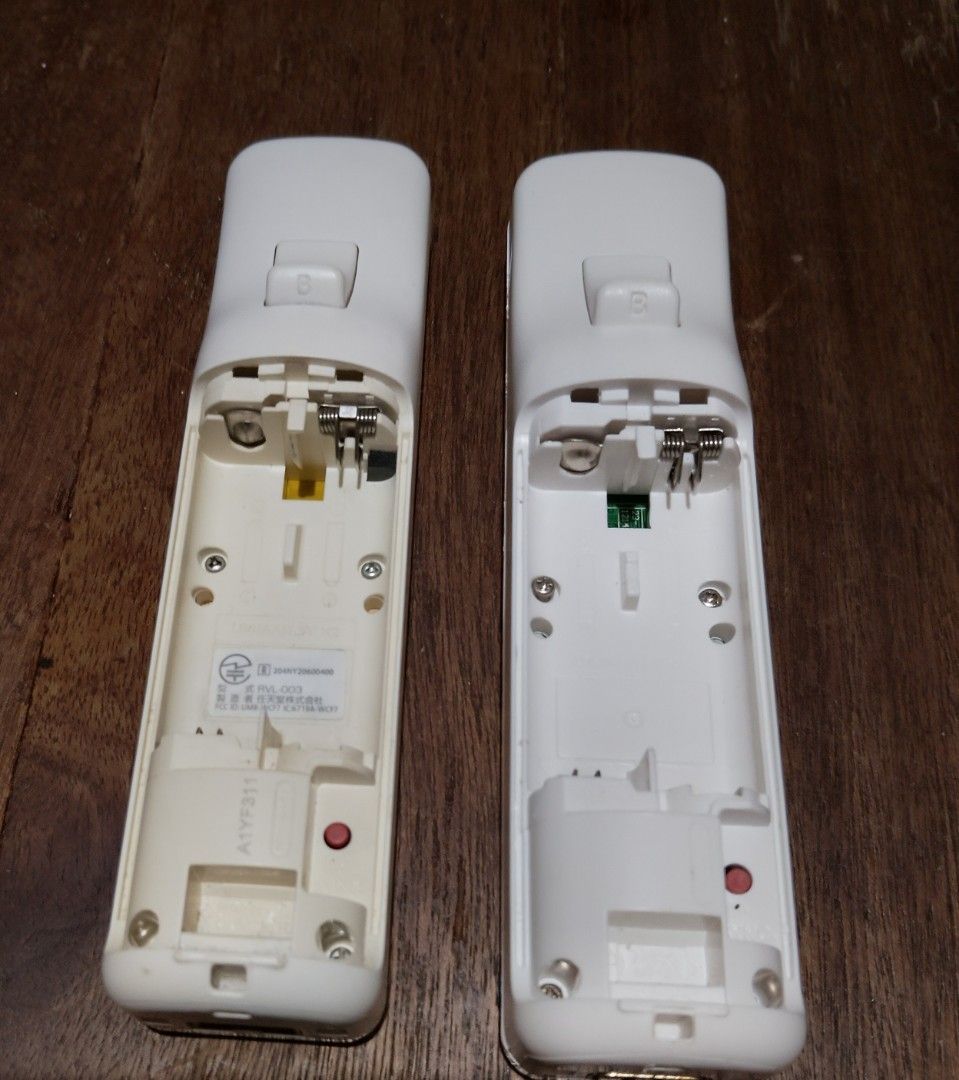 Nintendo Wii Remote Controllers Pair (Category: Controllers) located in Manila. Submitted by boyhet.thrift15 (Listing ID 1467114211, Image 2). Description: - Set of 2 original Nintendo Wii Remotes (Model RVL-003) - selling as is condition no unit for testing ung motion controller - ung clone controller lang ung gumagana sa battery ung orig. controller ayaw gumana for repair or parts out. - selling 400.