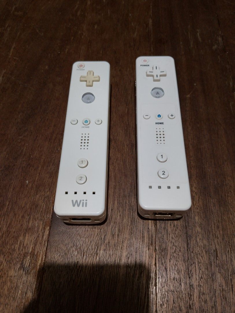 Nintendo Wii Remote Controllers Pair (Category: Controllers) located in Manila. Submitted by boyhet.thrift15 (Listing ID 1467114211, Image 1). Description: - Set of 2 original Nintendo Wii Remotes (Model RVL-003) - selling as is condition no unit for testing ung motion controller - ung clone controller lang ung gumagana sa battery ung orig. controller ayaw gumana for repair or parts out. - selling 400.