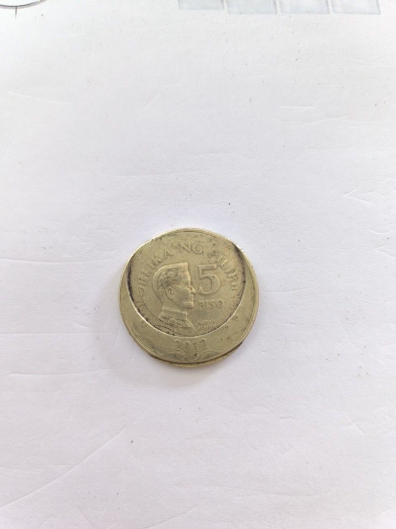 Off Centered 5 Peso Coin (Category: Everything Else Others) located in Manila. Submitted by malungcat (Listing ID 1467011002, Image 2). Description: .