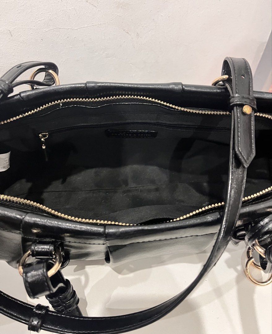 OG Charles & Keith Britton Elongated Shoulder bag (Category: Luxury Bags & Wallets) located in Manila. Submitted by kaelakishhh (Listing ID 1467073059, Image 3). Description: In excellent condition With original dust bag Bought last month used twice only.