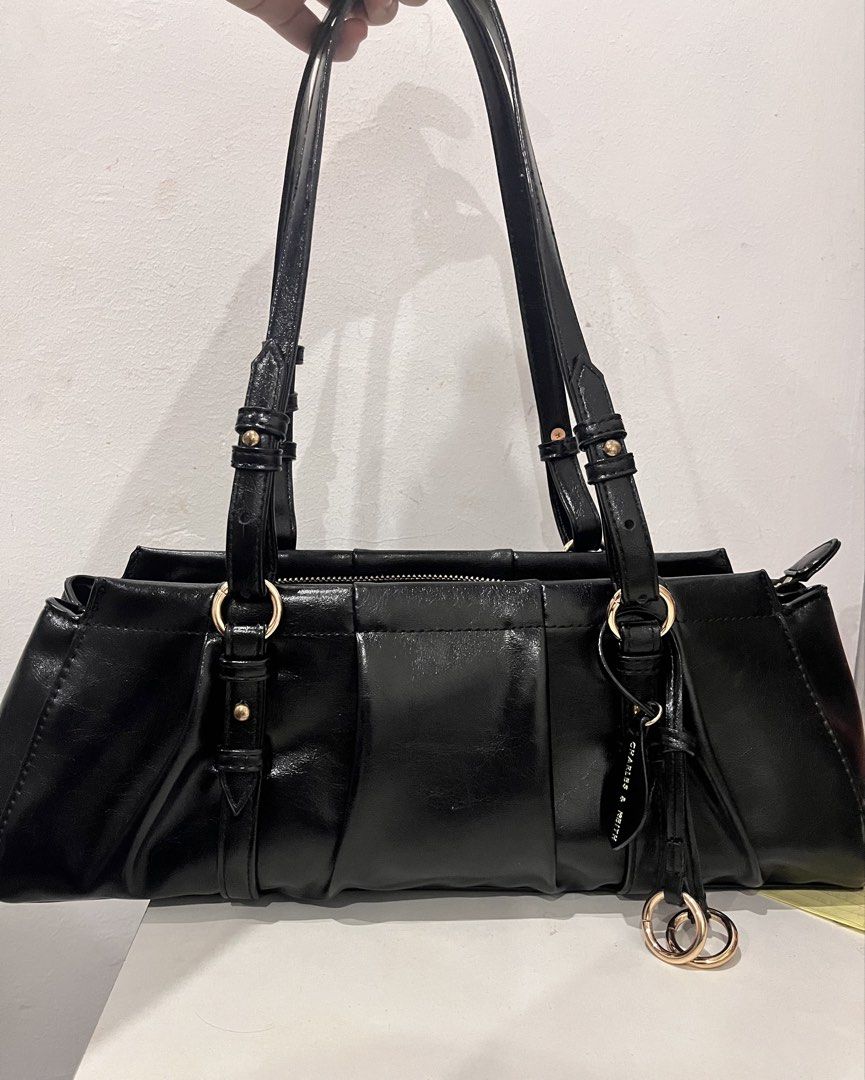 OG Charles & Keith Britton Elongated Shoulder bag (Category: Luxury Bags & Wallets) located in Manila. Submitted by kaelakishhh (Listing ID 1467073059, Image 1). Description: In excellent condition With original dust bag Bought last month used twice only.