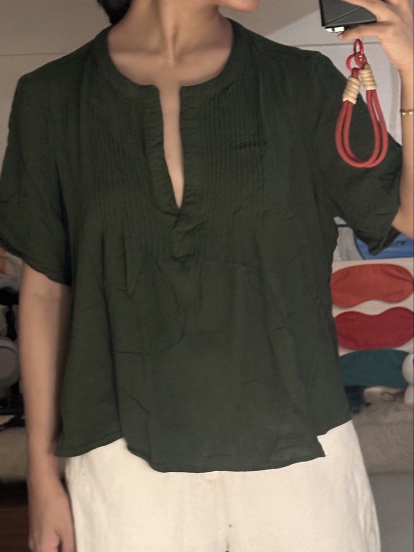 Old Navy Dark Green Rayon Blouse Size L (Category: Blouses) located in Manila. Submitted by donyadeclutters (Listing ID 1467072262, Image 3). Description: - Brand: Old Navy - Size: L - Color: Dark green - Material: 100% rayon (super soft, lightweight, and breathable) - Design: V-neckline, front pleat detailing, short sleeves - Fit: Loose and relaxed - Condition: Worn a few times, excellent shape worn by xs-s .