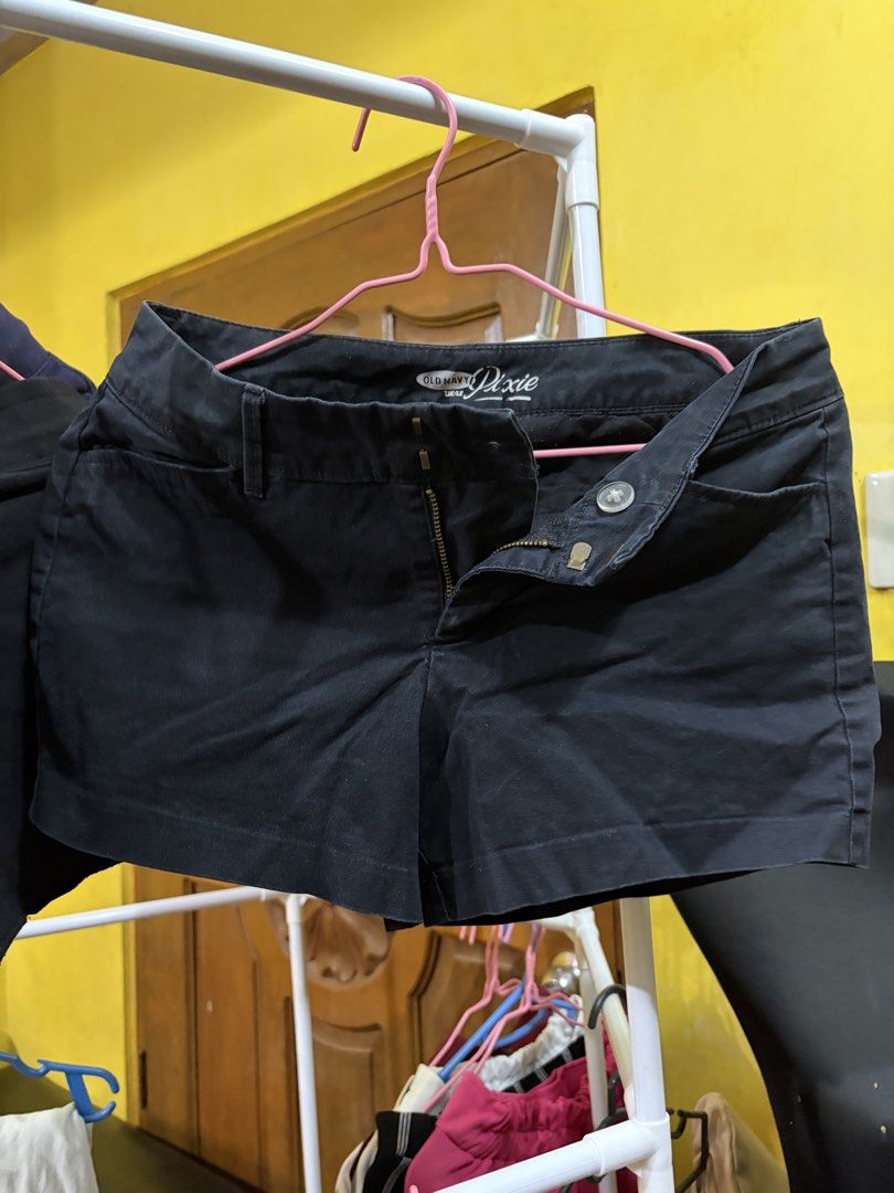 Old Navy Pixie Mid-Rise Black Shorts (Category: Shorts) located in Calamba. Submitted by handpickedbynetty (Listing ID 1467122466, Image 1). Description: - Brand: Old Navy - Item: Pixie Shorts - Color: Black - Fit: Classic mid-rise - Features: Zip fly with button closure, functional front pockets - Condition: Good everyday basic, with slight lint and wear near the inner seams - Perfect for warmer weather and casual styling.