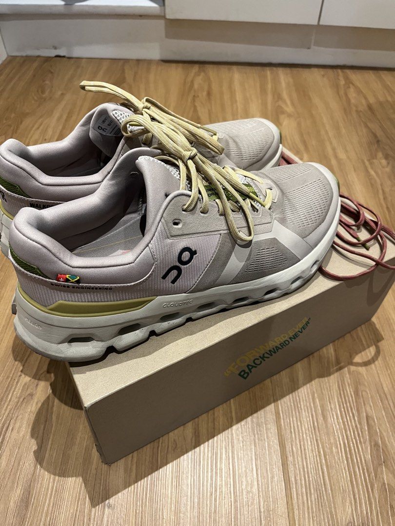 On Cloudrunner 2 WalkGood LA (Category: Sneakers) located in Pasig City. Submitted by gevyd (Listing ID 1467003226, Image 3). Description: - Model: On Cloudrunner 2 WalkGood LA - Size: Men's US 12 - Colorway: Cream upper with stylish olive green and maroon accents - Cushioning: Signature CloudTec midsole for all-day comfort - 9/10 Condition: Worn a few times, soles have very minimal dirt - Inclusions: Complete with original box and extra pair of 