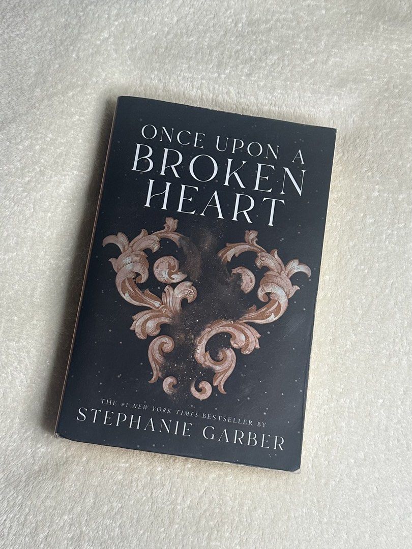 Once Upon a Broken Heart by Stephanie Garber (Category: Storybooks) located in Tabuk. Submitted by eiramenah (Listing ID 1467102868, Image 1). Description: - Title: Once Upon a Broken Heart by Stephanie Garber - Condition: never read, bought from fullybooked sm clark last year, little foxing, slight tanning, w plastic cover 850 for both books (book 1 & 2) rfs: need funds to buy uk version! :).
