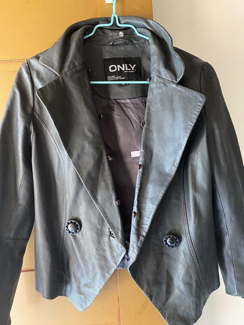 ONLY Grey Leather Jacket (Category: Coats, Jackets and Outerwear) located in Manila. Submitted by riaangela (Listing ID 1467010996, Image 1). Description: - Brand: ONLY - Color: Dark grey with brown inner lining - Material: Soft leather - Design: Structured collar and front button closure - Fit: Classic cut, great for layering in cooler weather If bundled with Tweed (also Medium size), Php 280 only FOR BOTH!.