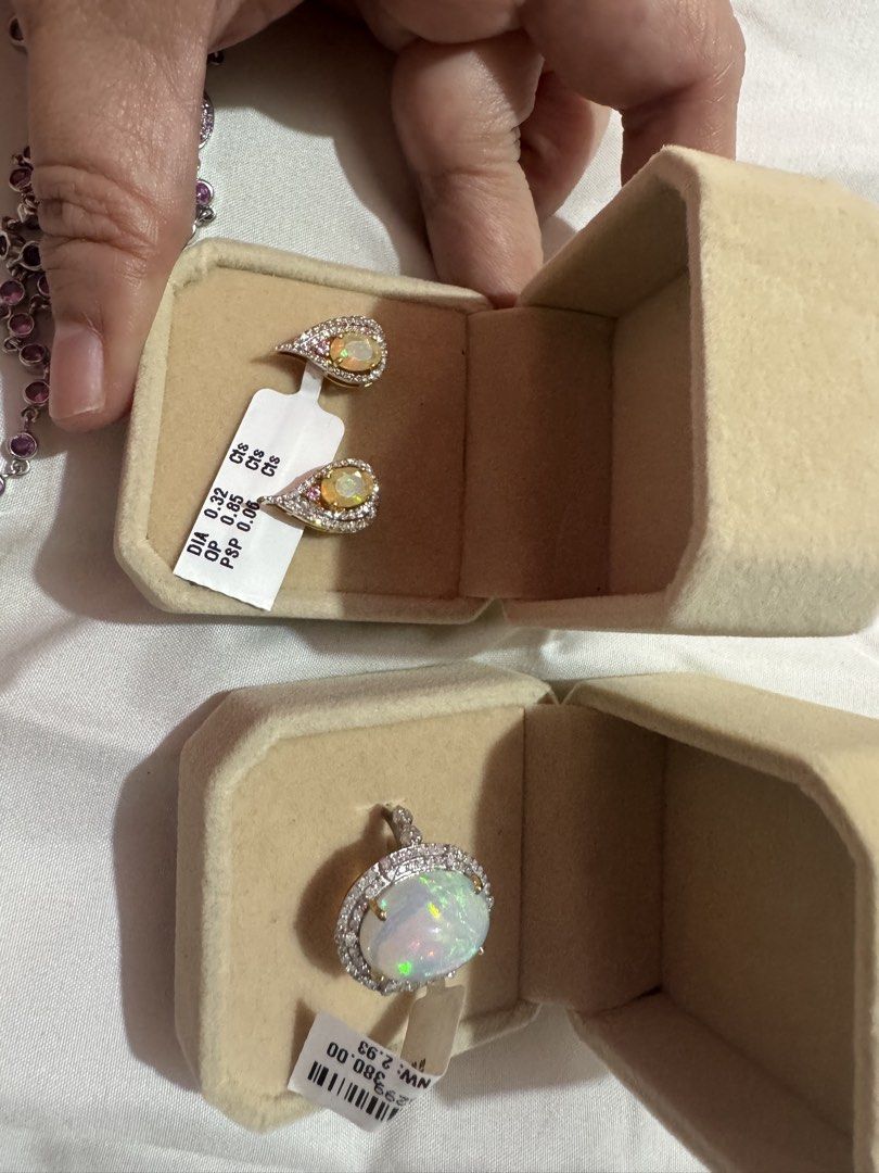 Opal and Diamond Earrings with Tag (Category: Earrings) located in Manila. Submitted by hackelina (Listing ID 1467030182, Image 3). Description: - Elegant opal and diamond teardrop earrings set in classic gold - Total carat weights: Diamond 0.32 cts, Opal 0.85 cts, PSP 0.06 cts - Secure post backs for comfortable, all-day wear - Catch the light beautifully with incredible sparkle - Includes a luxury beige velvet jewelry box, perfect for gifting o