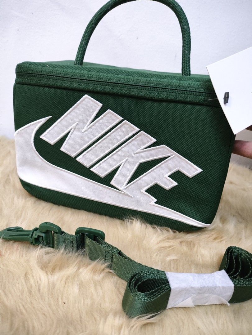 Original Nike small box type sling / crossbody (Category: Cross-body Bags) located in Rodriguez. Submitted by nemucohsiri (Listing ID 1466981527, Image 2). Description: 💯✔️Original 📌Brandnew condition ⭐Small size only.