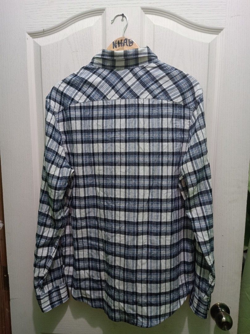 Original Penguin Plaid Long Sleeve Button-Down Shirt (Category: Tshirts & Polo Shirts ) located in Cavite. Submitted by nigo1993 (Listing ID 1467089270, Image 3). Description: - Brand: Original Penguin - Design: Classic plaid in blue, white, and black - Size: Large (Standard fit) - Measurements: 22 inches across the chest, 29 inches in length - Details: Button-down front with a standard collar - Condition: Great casual piece for everyday wear.