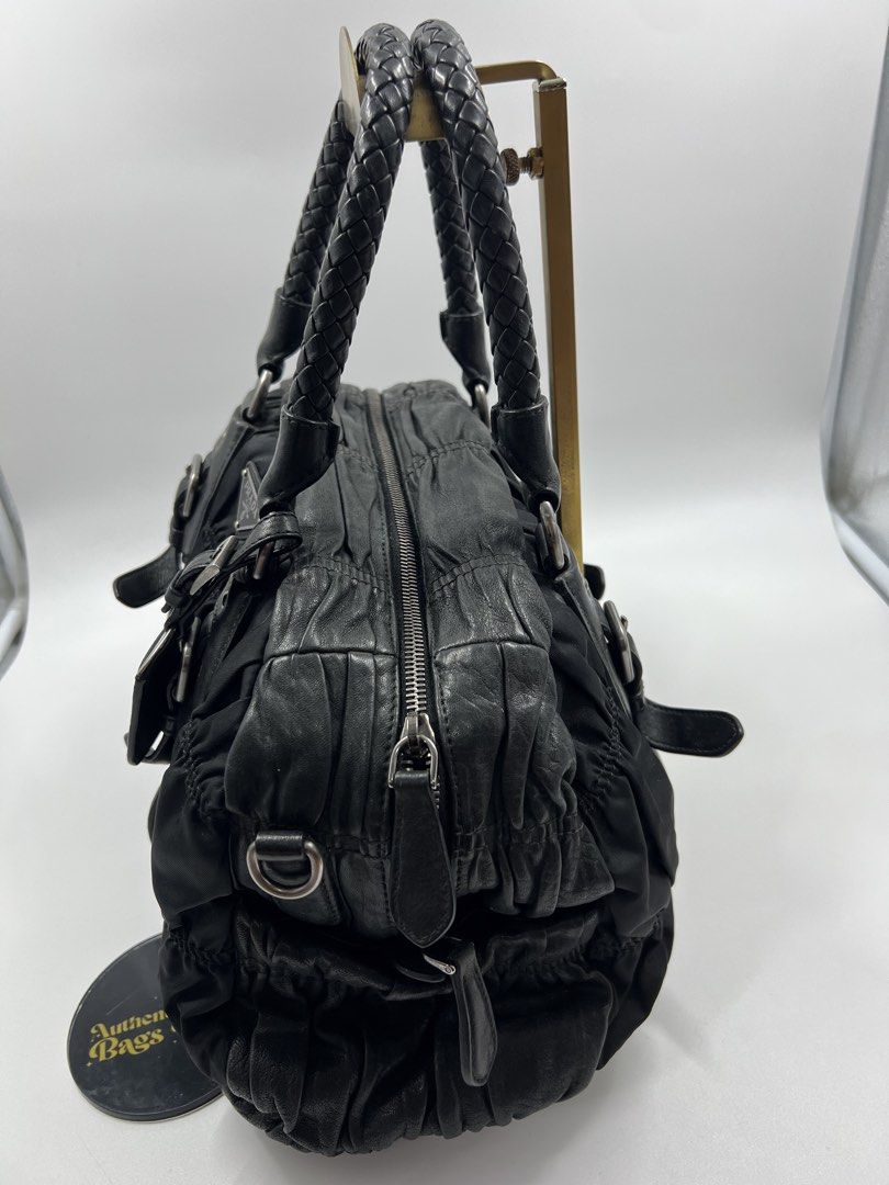 Original Prada Gaufre Black Boston Bag (Category: Luxury Bags & Wallets) located in Cavite. Submitted by authenticbagshavenbyvalg (Listing ID 1467062202, Image 3). Description: 💯Guaranteed Original good condition no major issue.