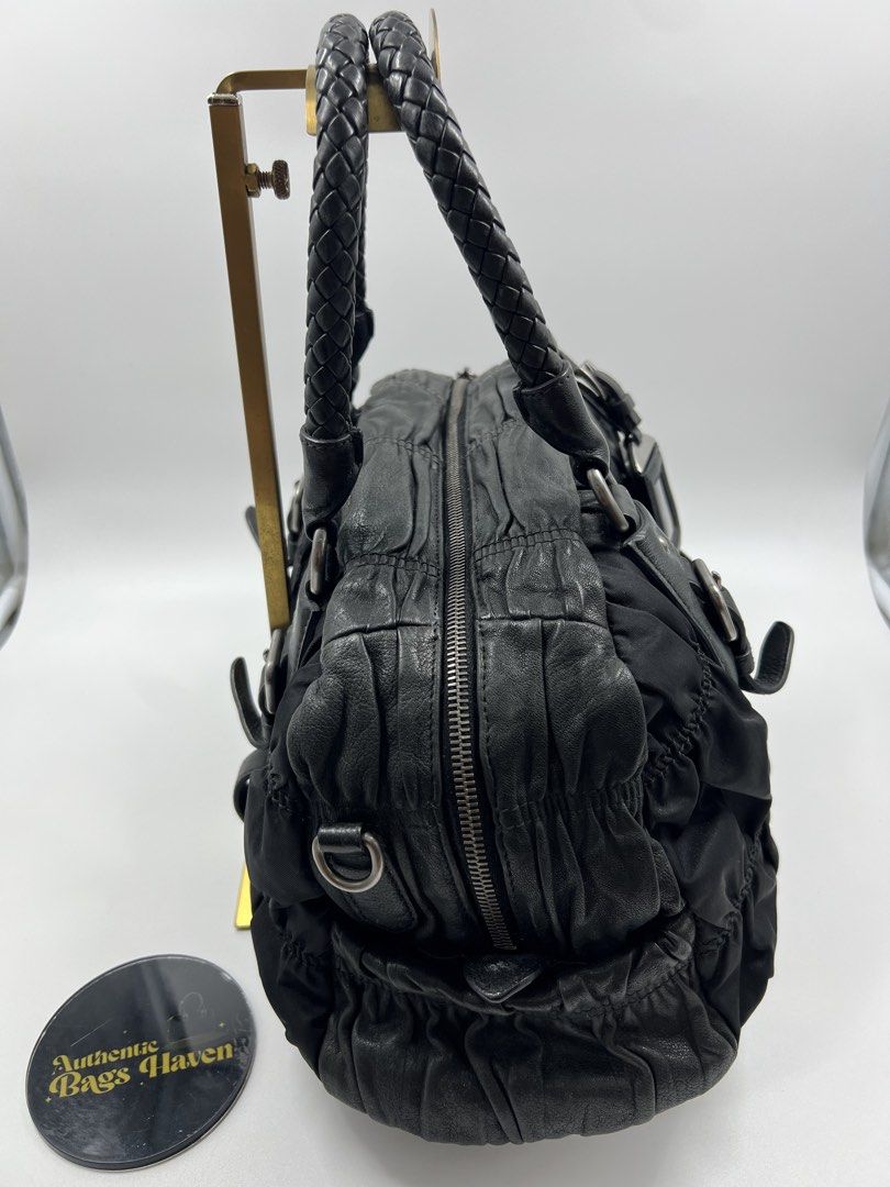 Original Prada Gaufre Black Boston Bag (Category: Luxury Bags & Wallets) located in Cavite. Submitted by authenticbagshavenbyvalg (Listing ID 1467062202, Image 2). Description: 💯Guaranteed Original good condition no major issue.
