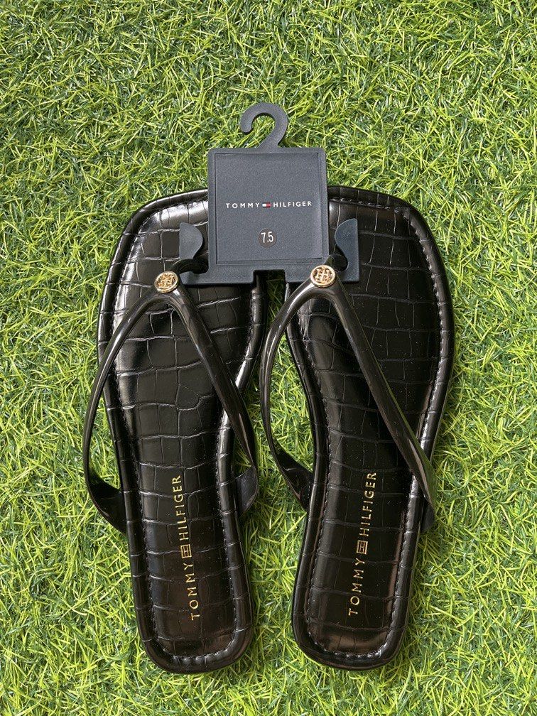 Original tommy hilfiger from U.S (Category: Slippers and slides) located in Manila. Submitted by ty_imported_goods (Listing ID 1467011169, Image 1). Description: Original from U.S Color: black Size: 7.5 Fit with size 6.5 to 7.5.