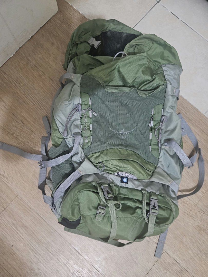Osprey Kestrel 38 Hiking Backpack Green (Category: Backpacks) located in Taguig. Submitted by joyvillanueva (Listing ID 1466972042, Image 3). Description: - Brand: Osprey Kestrel 38 Hiking Backpack - Color: Olive Green - Comfort: Padded mesh back panel, adjustable shoulder straps, and supportive hip belt with pockets - Storage: Multiple exterior compartments, bungee attachment points, and secure drawstring top closure under a lid - Ideal for: Day