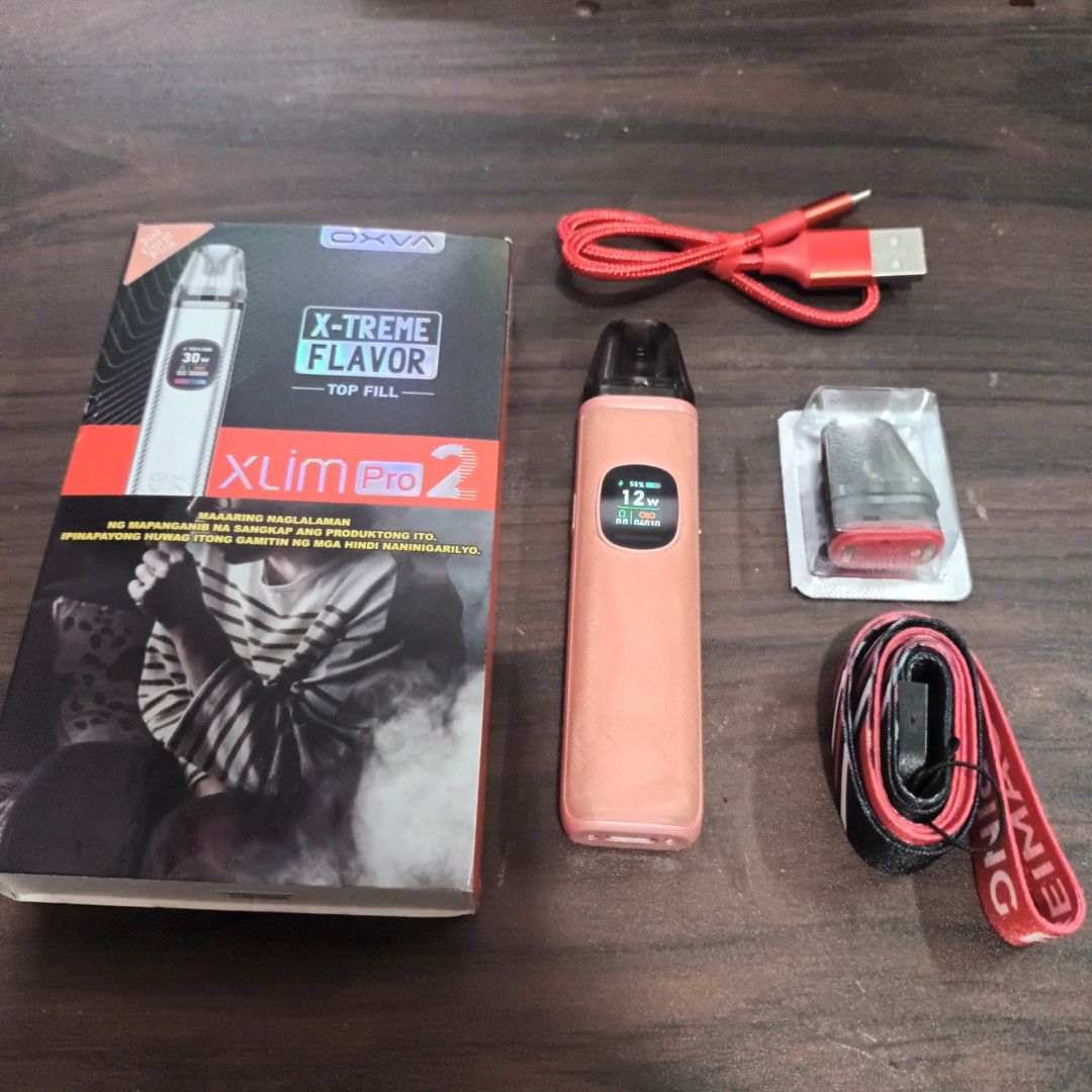 Oxvá Xlim Pro 2 (Category: Everything Else Others) located in Santa Rosa. Submitted by ViancaVinarao (Listing ID 1467064246, Image 3). Description: Device: Coral Pink Complete w/ box, charger and extra pod Mop: Gcash/Bank Transfer Loc: Sta Rosa Laguna Delivery: Pickup or Lalamove .