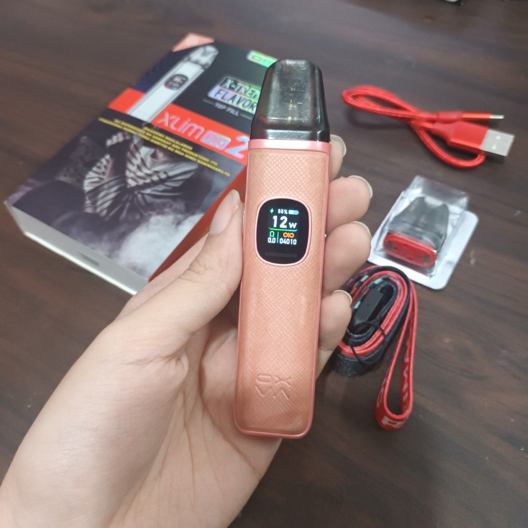 Oxvá Xlim Pro 2 (Category: Everything Else Others) located in Santa Rosa. Submitted by ViancaVinarao (Listing ID 1467064246, Image 2). Description: Device: Coral Pink Complete w/ box, charger and extra pod Mop: Gcash/Bank Transfer Loc: Sta Rosa Laguna Delivery: Pickup or Lalamove .