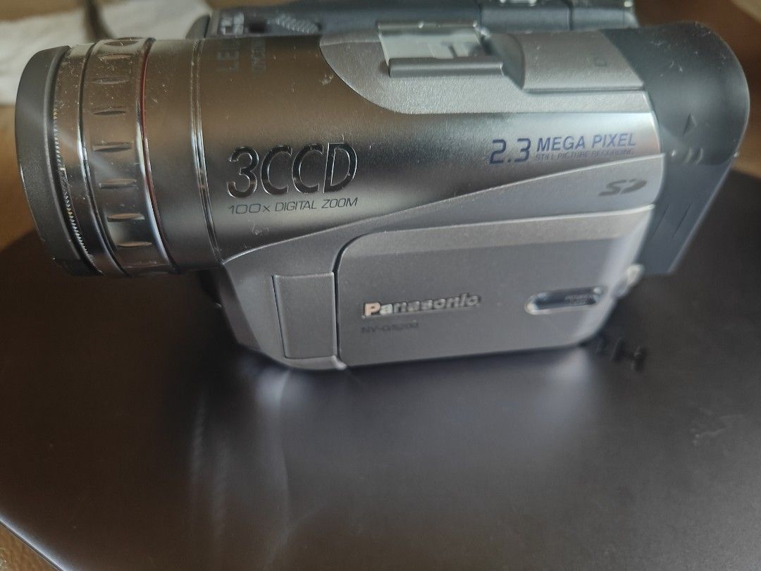 Panasonic NV-GS200 3CCD Digital Video Camera (Category: Video Cameras) located in Manila. Submitted by wuxue998 (Listing ID 1467019685, Image 1). Description: Almost 100%new, - Model: Panasonic NV-GS200 Digital Video Camera (Japanese Domestic Model, 2004) - Format: Vintage miniDV, ideal for retro aesthetic videos - Key Specs: 3CCD system for superior color, 100x digital zoom, 2.3 MP still picture recording, SD card slot - Color: Sleek silver body