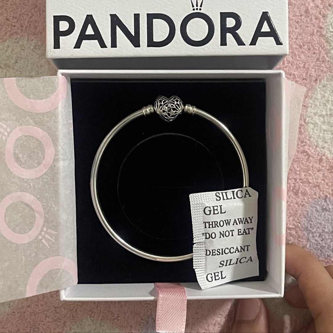 pandora silver bangle with heart charm (Category: Bracelets) located in Pasig City. Submitted by sirendiva_ (Listing ID 1467007797, Image 2). Description: - original - worn once for sizing, too loose on my wrist - idk the measuring on this bangle.