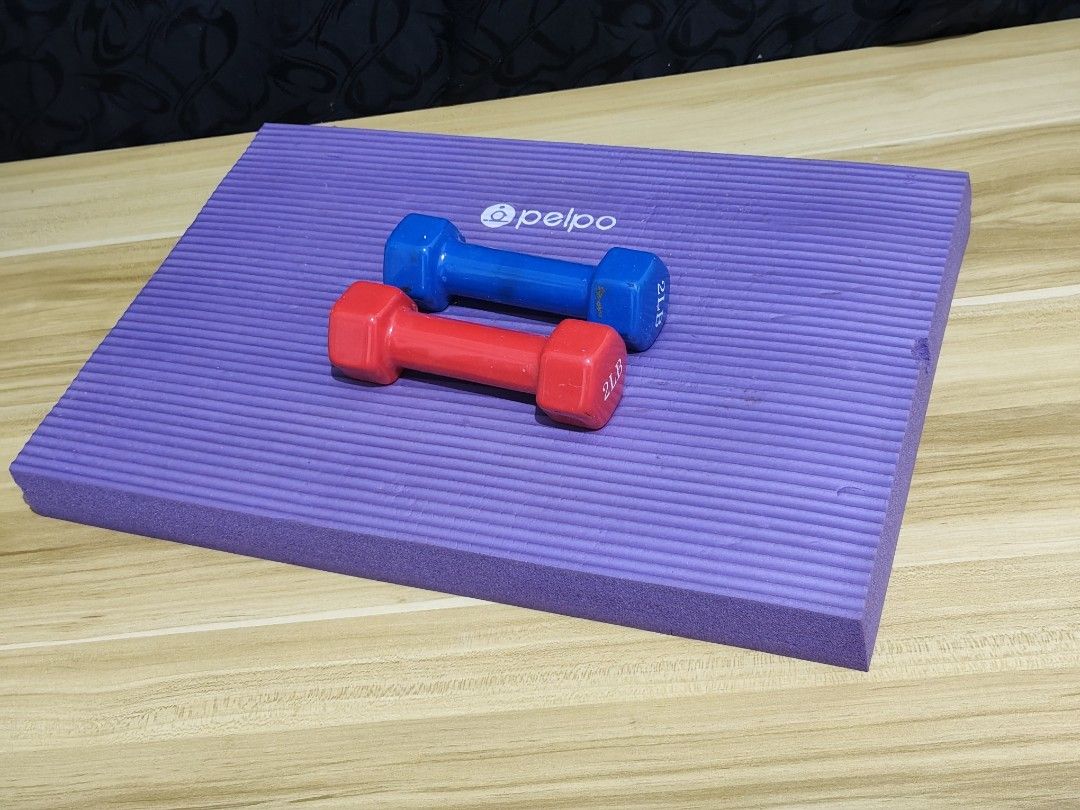Pelpo Purple Exercise Mat with Two 2LB Dumbbells (Category: Exercise Mats) located in Taytay. Submitted by goldentree-b9df (Listing ID 1466979777, Image 1). Description: - Purple Pelpo exercise mat with textured surface for extra grip - Includes two 2LB dumbbells (one red, one blue) - Compact and clean setup, great for home workouts and stretching - Easy to roll up and store away after use.