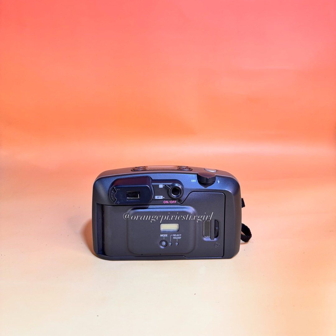 Pentax Espio 140 35mm Film Camera (Category: Cameras) located in Bulacan. Submitted by orangepixiestixgirl (Listing ID 1467164563, Image 2). Description: ‼️message me on ig, @orangepixiestixgirl for inquiries and transactions‼️ ‼️CAN’T REPLY HERE‼️ Pentax Espio 140 35mm Film Camera —35mm film camera with fully automatic exposure, film advance, and rewind. —38–140mm power zoom lens. —Multi-point active autofocus system. —Flash and Zoom working. —U