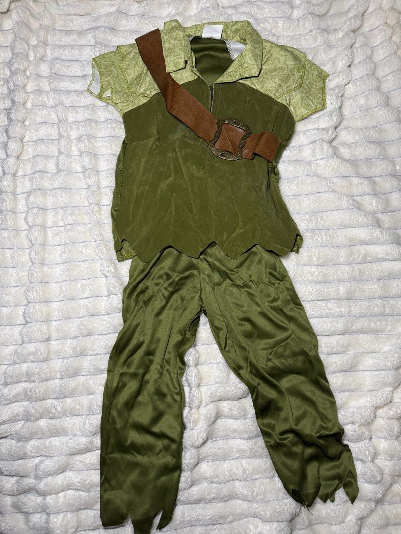 Peter Pan Kids Costume (Category: Babies & Kids Fashion) located in Quezon City. Submitted by lala.sonnybbs (Listing ID 1466995777, Image 1). Description: Includes green top, matching trousers, brown faux leather belt, feathered hat, pointy elf ears, and boot covers Size: XS, good for 3-4yrs old.