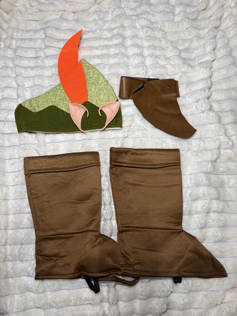 Peter Pan Kids Costume (Category: Babies & Kids Fashion) located in Quezon City. Submitted by lala.sonnybbs (Listing ID 1466995777, Image 2). Description: Includes green top, matching trousers, brown faux leather belt, feathered hat, pointy elf ears, and boot covers Size: XS, good for 3-4yrs old.