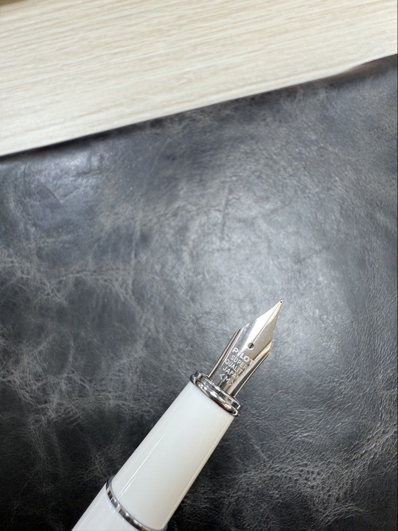 Pilot Prera White Fountain Pen Medium Nib (Category: Stationery & School Supplies) located in Manila. Submitted by kienkien (Listing ID 1467074832, Image 3). Description: Bought for PHP1,868 from a trusted seller on the orange app (see last photo). Almost never used. Reselling low. - Model: Pilot Prera Fountain Pen - Color: White with sleek silver trim - Nib: Medium stainless steel (Pilot Japan) - Finish: Clean, glossy resin body and cap - Inclus