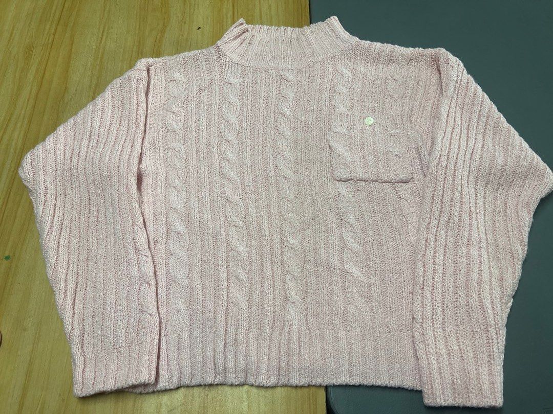Pink Cable Knit Mock Neck Sweater (Category: Coats, Jackets and Outerwear) located in Bulacan. Submitted by Domozz (Listing ID 1467038985, Image 1). Description: Length 24 Width 22 L to Xl stretchable Womens Pink.
