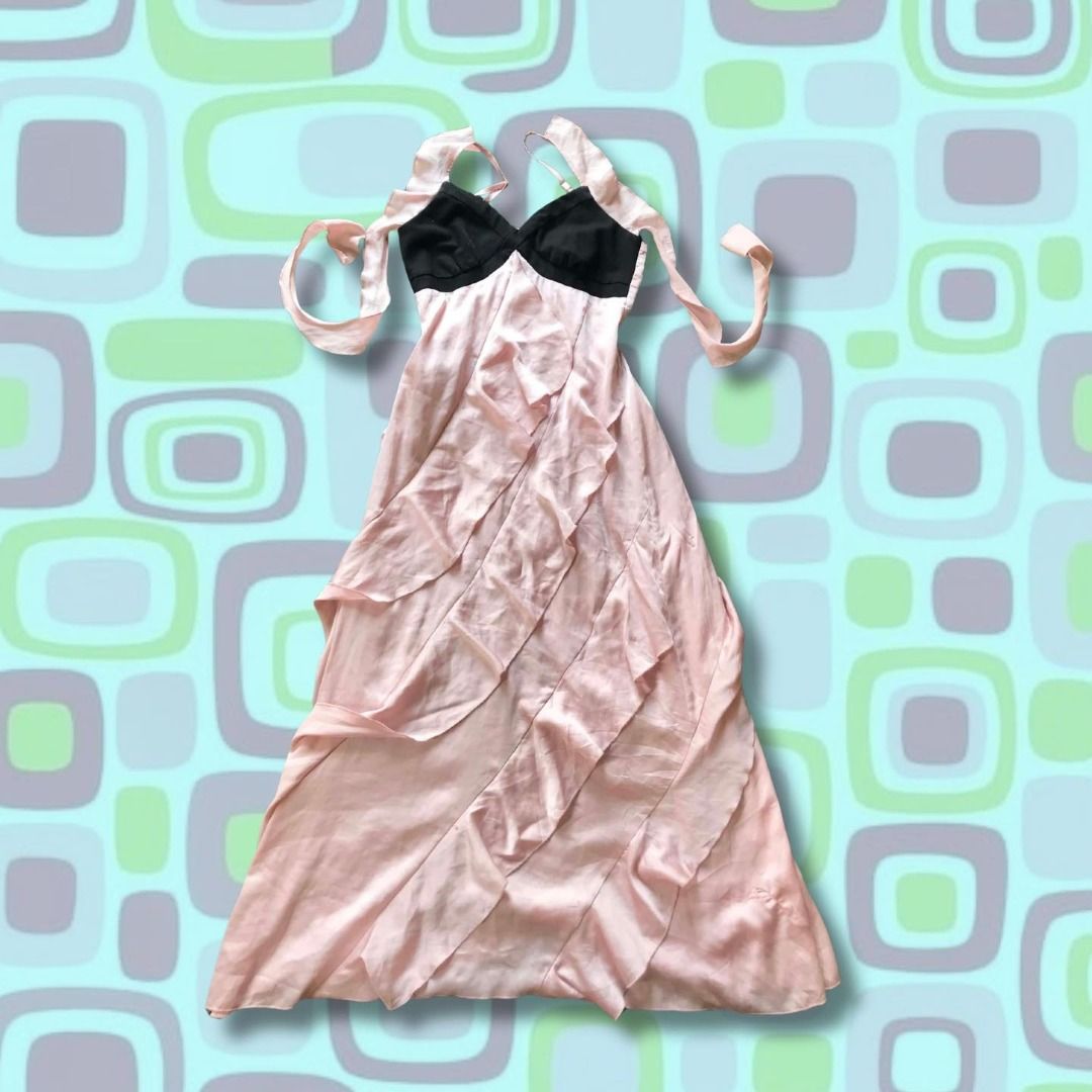 Pink Satin Skirt with Flawed Seam (Category: Skirts) located in Pili. Submitted by xi4cl0set (Listing ID 1467167649, Image 3). Description: - Color: Beautiful light pastel pink - Material: Smooth, silky satin fabric - Design: Features a clean rolled hem edge along the top fold - Styling: Versatile piece that easily pairs with casual tees or elegant blouses - Condition: Good overall, with a minor flaw/slight fray at the seam s-m MOD: Gcash, NO COD
