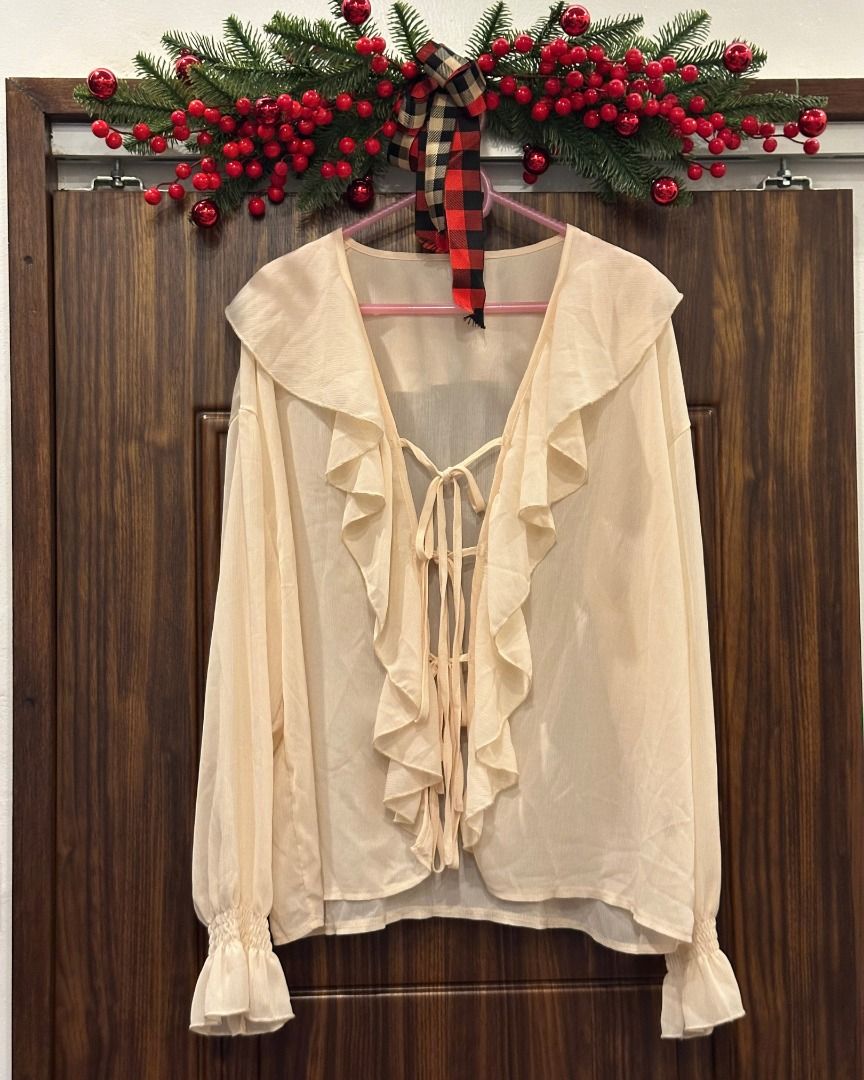 Pink Sheer Ruffled Longsleeve Top (Category: Longsleeves) located in Pasig City. Submitted by p.re.loved (Listing ID 1467056009, Image 1). Description: - Sheer longsleeves top - Ruffled longsleeves - Size L - Oversized fit.