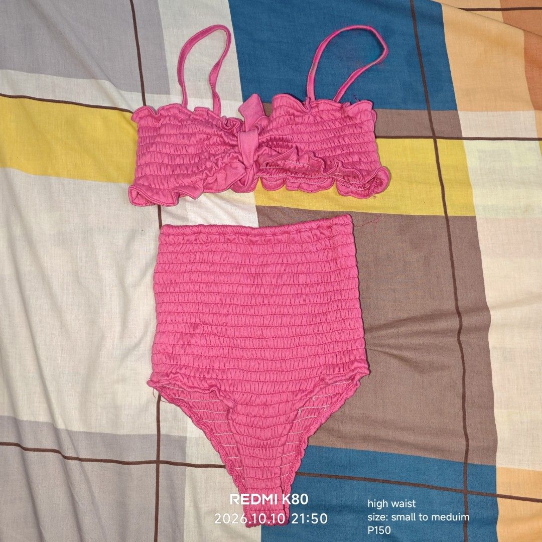 Pink smocked high waist bikini set (Category: Bikinis & Swimsuits) located in Manila. Submitted by emailmeonj79332 (Listing ID 1467154744, Image 1). Description: - Style: Bright pink two-piece bikini set - Details: All-over smocked texture, tie-front crop top with thin straps, and high-waisted bottoms with playful ruffled trim - Fit: Stretchy fabric that comfortably fits small to medium frames - Perfect for: Beach trips, vacations, and poolside l