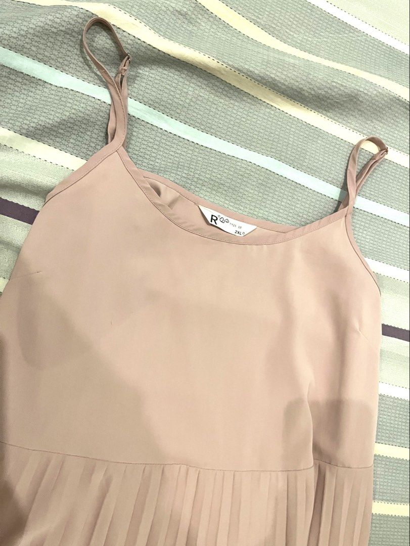 Pink Spaghetti Strap Pleated Maxi Dress (Category: Dresses) located in San Mateo. Submitted by smtyabl (Listing ID 1467117654, Image 2). Description: - Color: Dusty pink - Size: M- 2XL - Design: Round neckline with adjustable spaghetti straps - Fit: Relaxed fit through the body - Details: Lightweight fabric featuring a solid top and a textured pleated bottom half starting below the hip - Length: Midi to maxi length (depending on height).