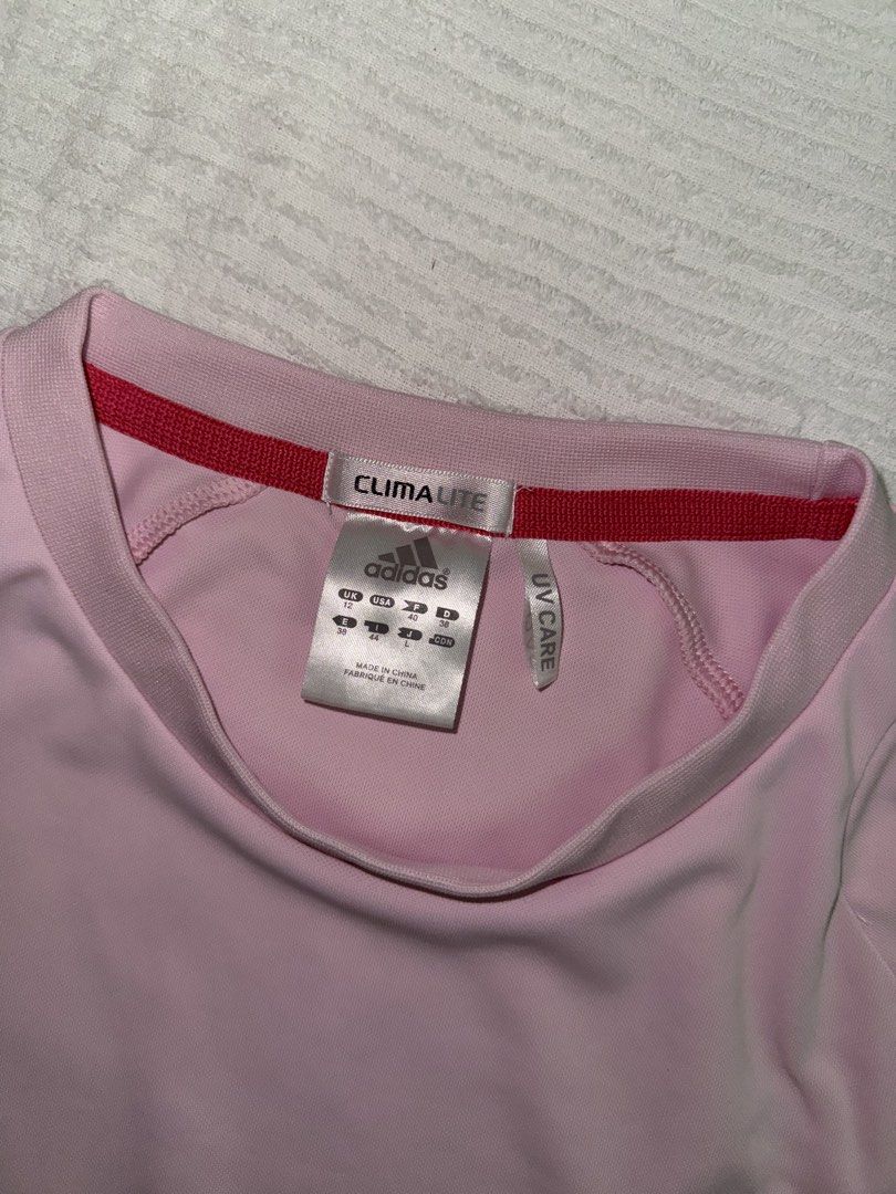 Pink Sports Shirt (Category: Activewear) located in Daet. Submitted by sbcookieee (Listing ID 1467034701, Image 3). Description: Length: 62 cm Width: 46 cm .