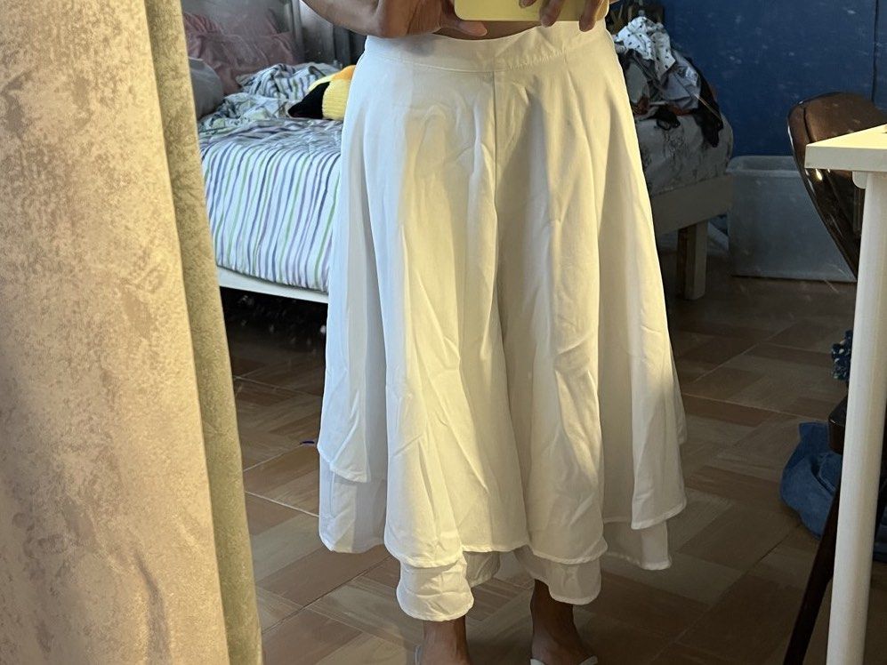 Plains & Prints White Layered Skirt/Skort (Category: Skirts) located in Bulacan. Submitted by fallongallon (Listing ID 1467039353, Image 1). Description: - Brand: Plains & Prints - Color: White - Size: M / EUR 10 / USA 6 - Design: Layered ruffle with lightweight, flowy fabric - Closure: Side zip - Condition: Good overall, clean and crisp look - Style: Versatile for casual days or special events.