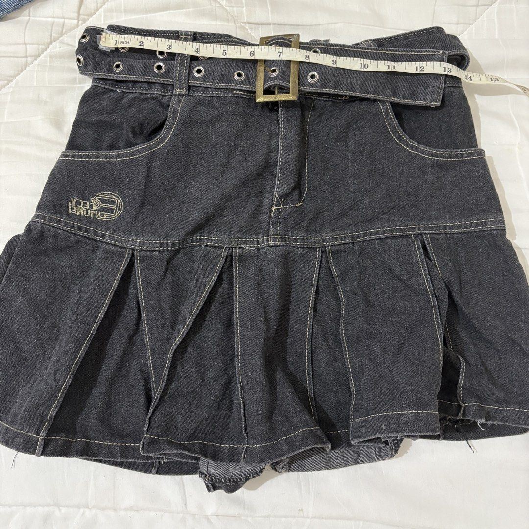 Pleated Denim Black Skirt (Category: Skirts) located in Dasmarinas. Submitted by twiceasnewph (Listing ID 1467122852, Image 1). Description: Preloved size waist 26 inches length 16 inches Rfs: decluttering.
