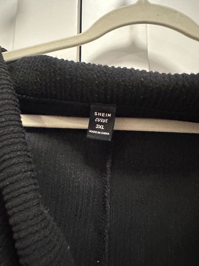 plus size - black off shoulder knit sweater (3xl) (Category: Longsleeves) located in Muntinlupa City. Submitted by hello.fran (Listing ID 1467145759, Image 2). Description: 👗 about the item: - material: warm textured ribbed knit fabric - design: long sleeves, foldover collar, and chunky draped front wrap detail - condition: great for cold weather layering and cozy everyday wear ✨ reason for selling: decluttering! just clearing out space in my cl