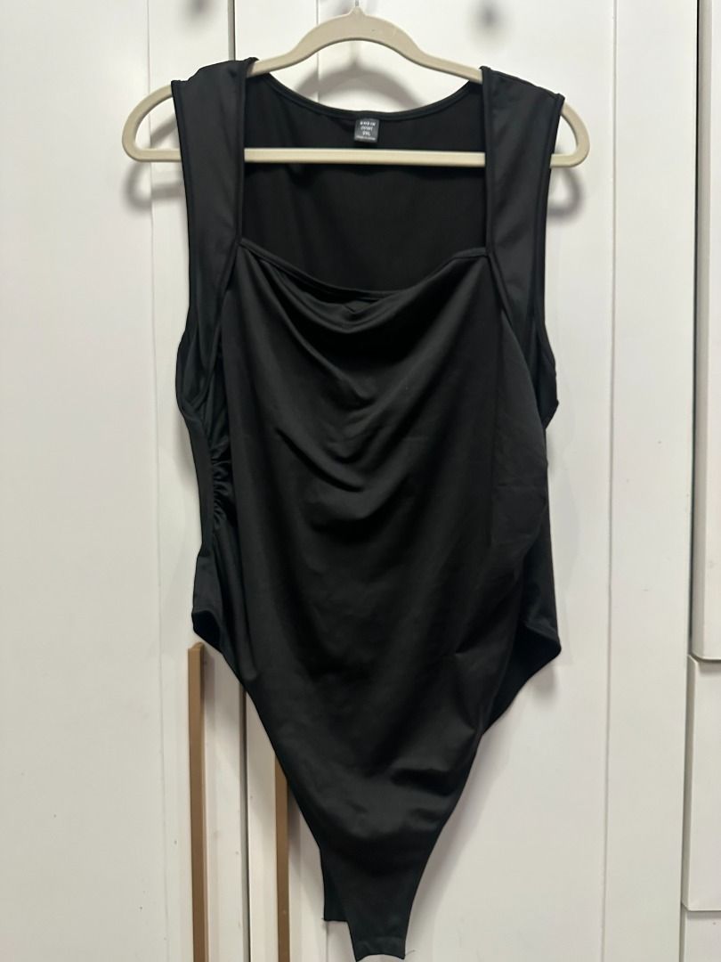 plus size - black sleeveless square neck bodysuit (2xl) (Category: Sleeveless) located in Muntinlupa City. Submitted by hello.fran (Listing ID 1467144192, Image 1). Description: 👗 about the item: - design: square neckline, draped gathered front, tank straps, solid back, bottom snaps - material: super stretchy, body-hugging fabric - styling tip: easy to pair with high-waisted jeans, shorts, or skirts for a sleek look! ✨ reason for selling: declut