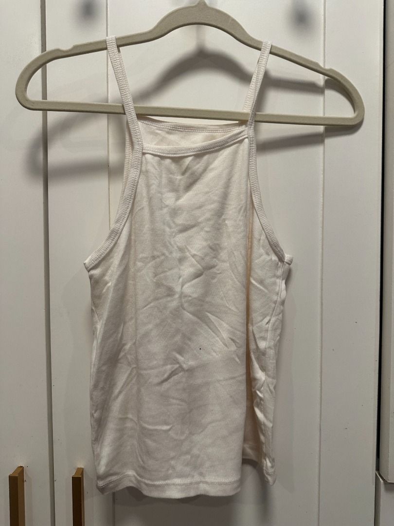 plus size - white halter cami tank top (Category: Sleeveless) located in Muntinlupa City. Submitted by hello.fran (Listing ID 1467132163, Image 2). Description: 👗 about the item: - design: square neckline with thin straps - material: soft and comfortable fabric - versatility: easy to match with jeans, skirts, or shorts - ideal for: everyday casual wear ✨ reason for selling: decluttering! just clearing out space in my closet. 💵 mode of payment: 