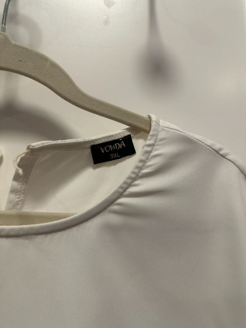 plus size - white short bell sleeves blouse (3xl) (Category: Blouses) located in Muntinlupa City. Submitted by hello.fran (Listing ID 1467143696, Image 3). Description: 👗 about the item: - style: loose fit, bell short sleeve casual top - neckline: crew neck with a small back opening - material: lightweight and comfortable fabric.