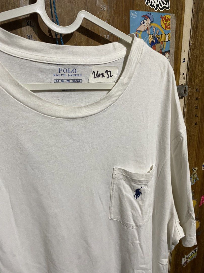 Polo Ralph Lauren White Pocket Tee XLT (Category: Tshirts & Polo Shirts ) located in Imus. Submitted by frootiloots4103 (Listing ID 1467153785, Image 2). Description: - Brand: Polo Ralph Lauren - Color: Solid White - Size: XLT (185/124C) - Pit to Pit: 26 inches - Length: 32 inches - Details: Classic crew neck, single chest pocket with signature embroidered blue pony logo - Material: Clean cotton fabric - Condition: Excellent / Ready to wear OPEN 